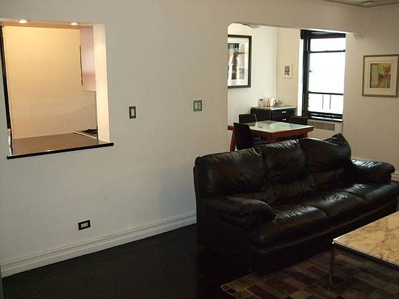 Living Room looking towards kitchen, dining