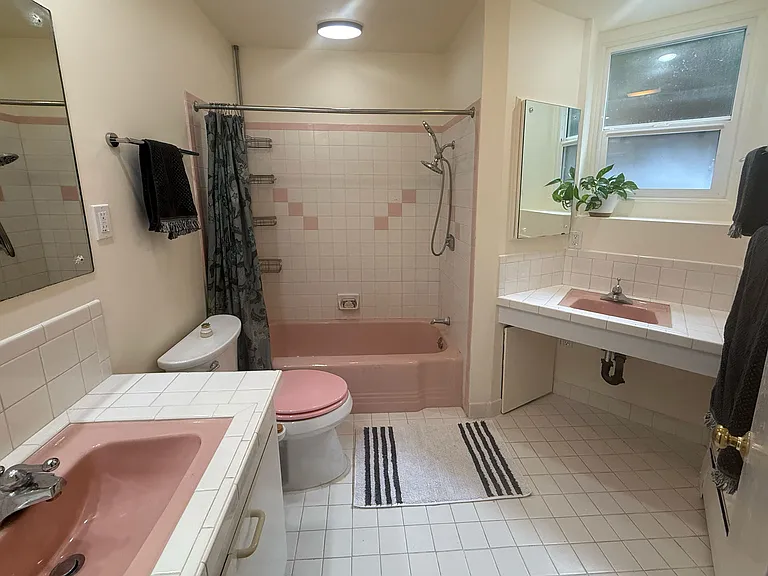 Vintage 1950s bathroom with matching sinks