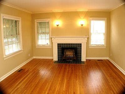 Roomy Living Room with beautiful hardwood floors