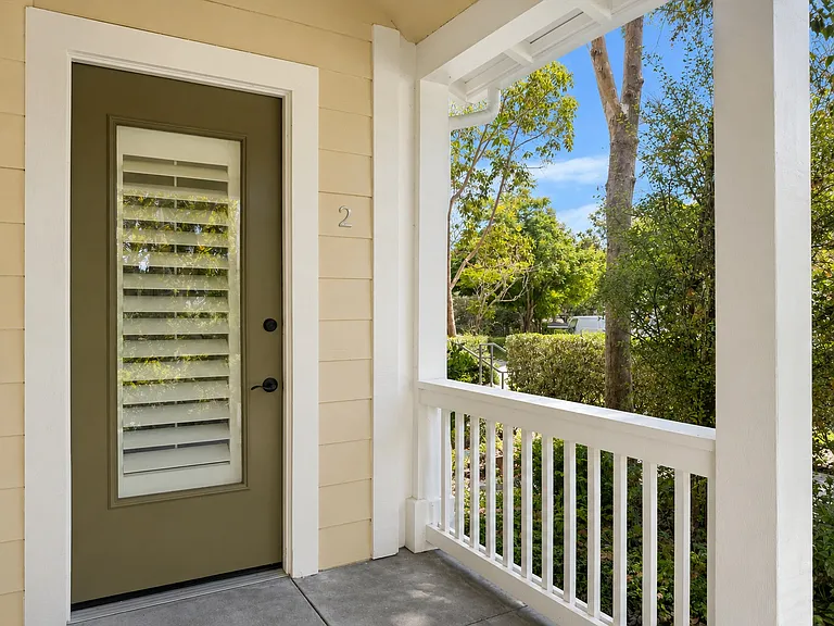 Private covered entrance offering added privacy and a welcoming arrival.