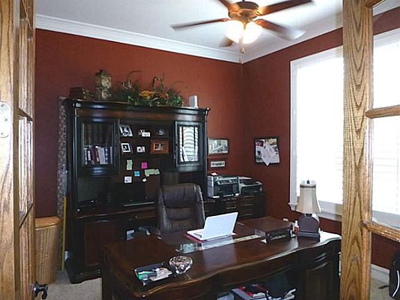 Large office with french doors off of foyer.