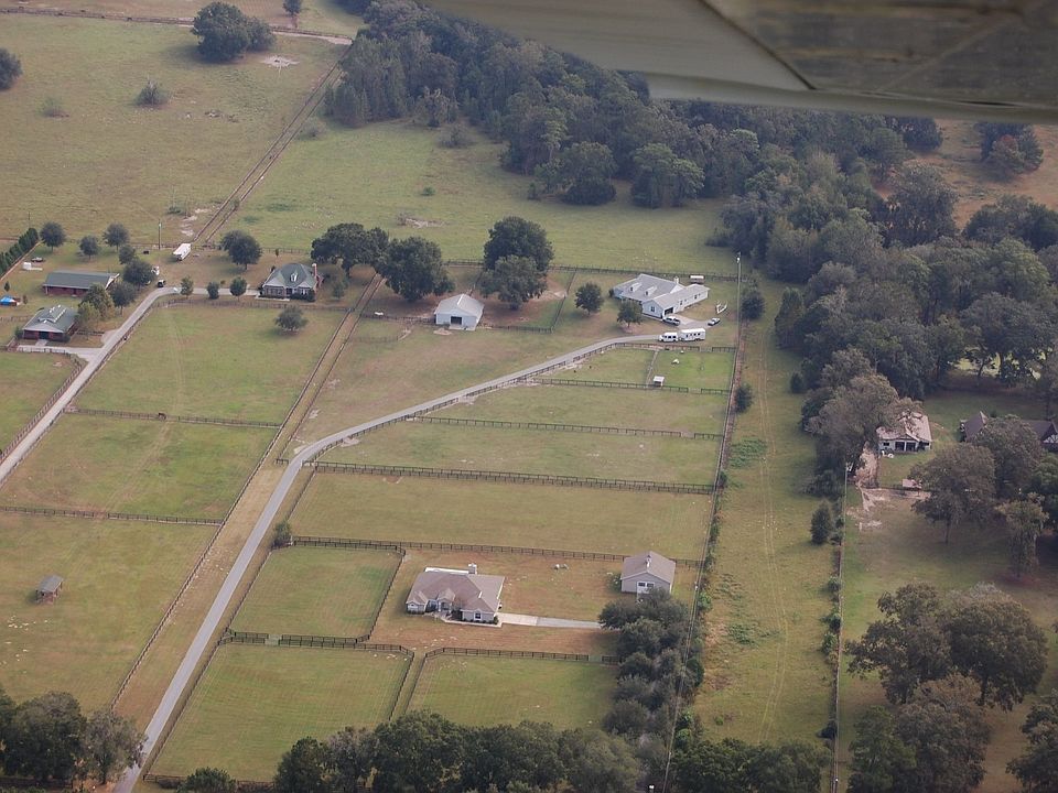 Aerial view of house & barn