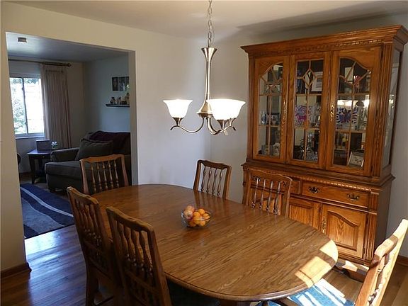 The dining room features updated lighting.