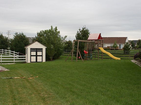 Backyard with Shed and Swingset