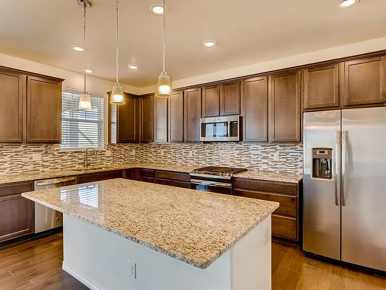 Upgraded GE Stainless Stain appliances. Gourmet gas stove with grill.