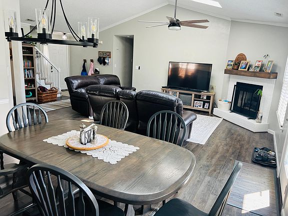 Dinning/living area with vaulted ceilings