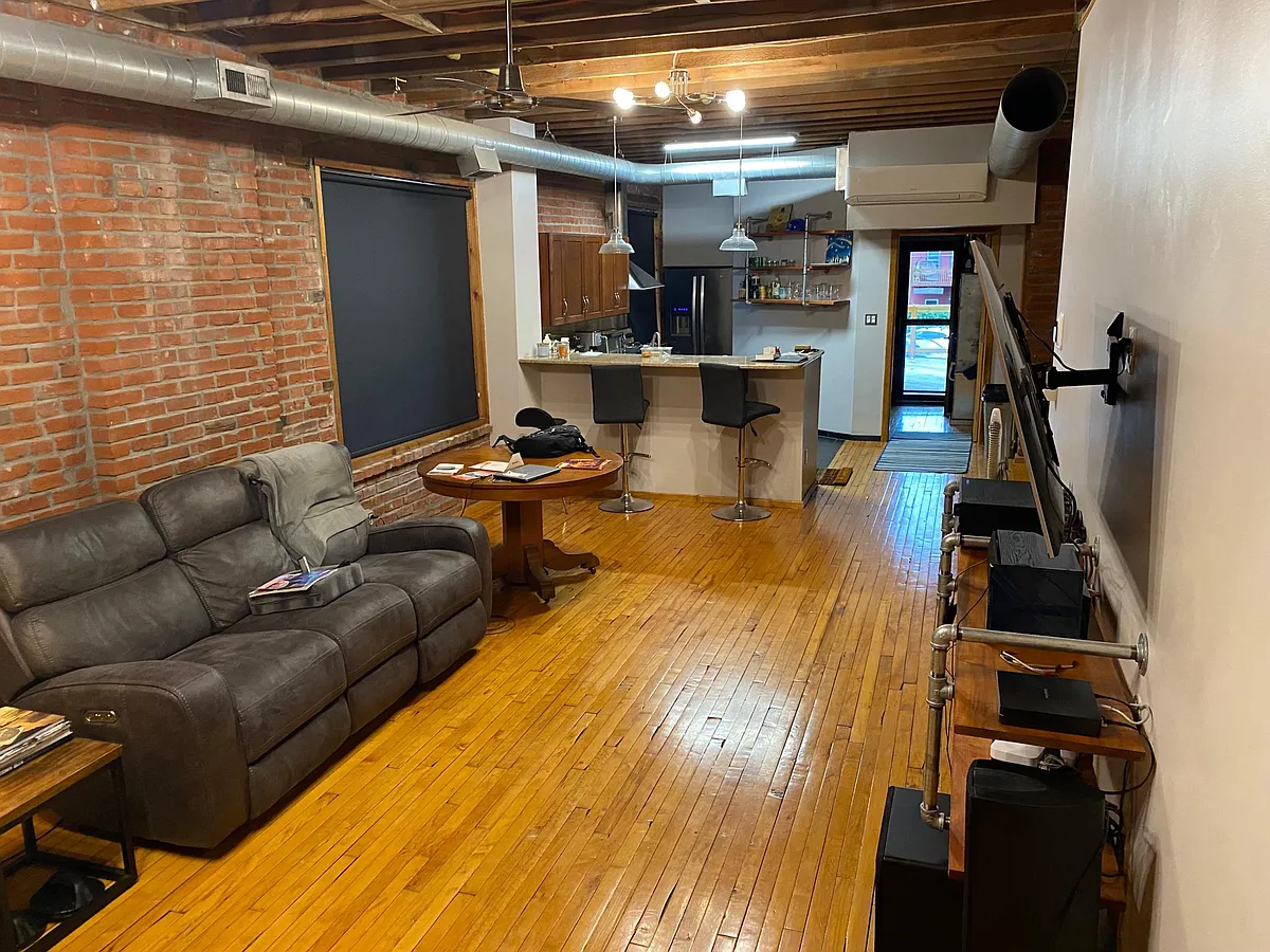 Living room looking towards rear of unit - 513 Campbell St #1