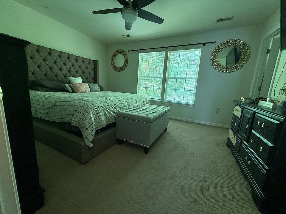 Master bed with walk-in closet
