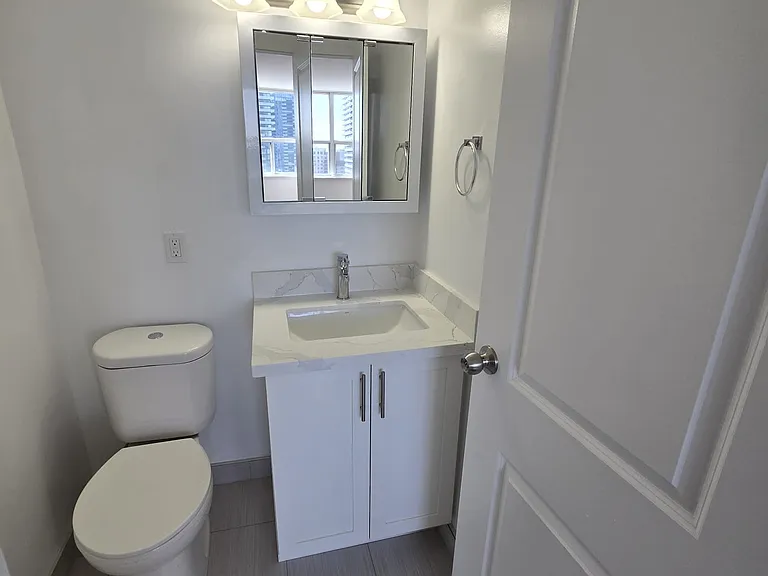 66 Broadway Ave — Photo 56