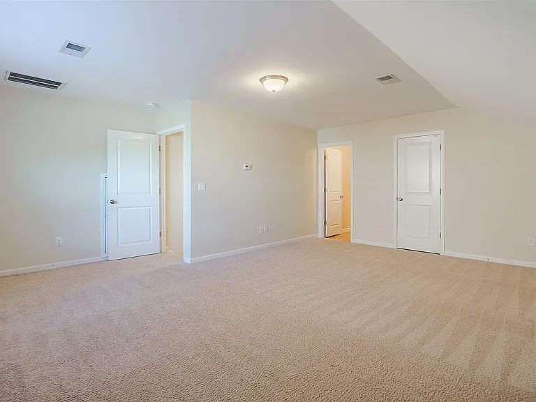 Extra large upstairs bedroom with spacious closet and full bathroom.