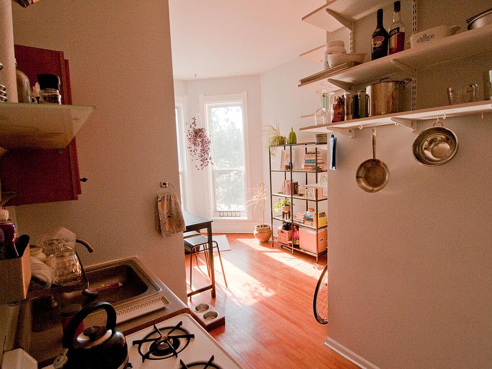 Small Kitchen with dining area that faces South and view of 