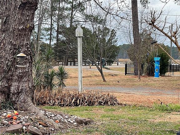 View to the entrance to the Public Boat launch and river from the front yard.