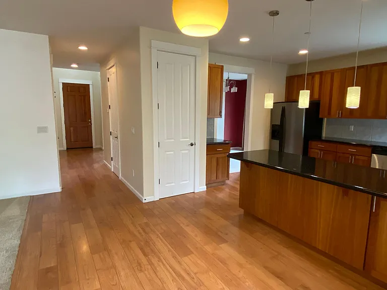 Tall ceilings and 8 ft doors, laminate flooring