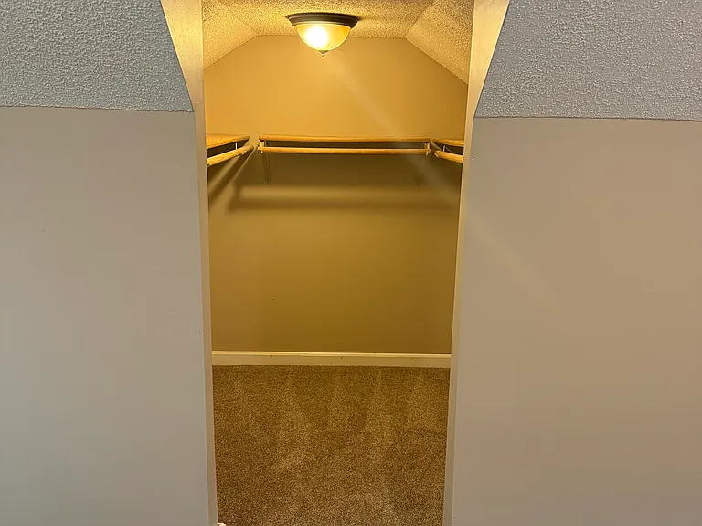 Upstairs bedroom walk in closet