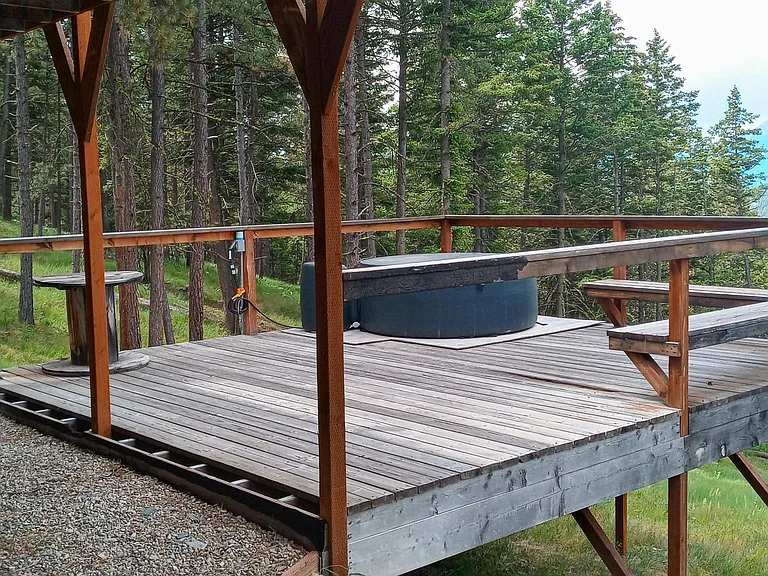 Lower deck and hot tub.