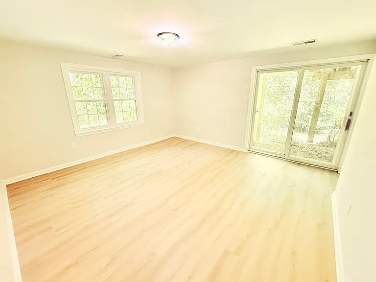 Second basement bedroom off main living area with walkout