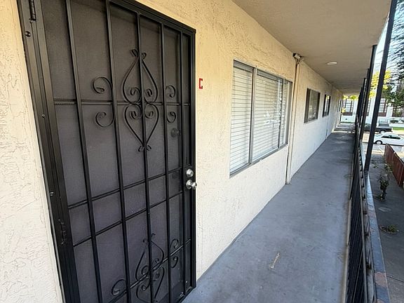 Front gated door entrance & hallway
