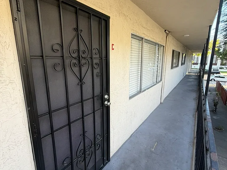 Front gated door entrance & hallway