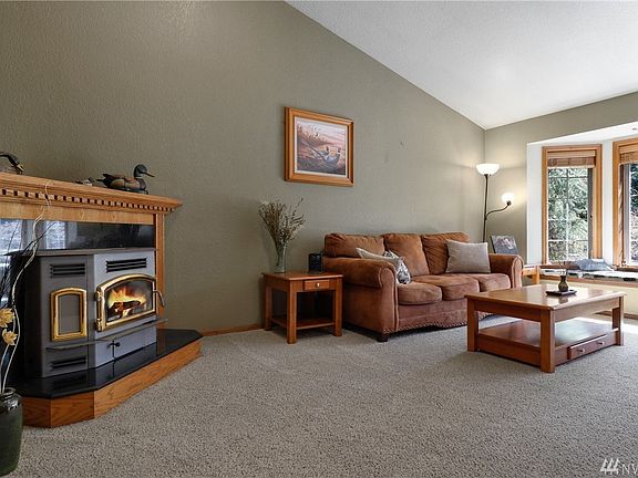 Living room with beautiful, functional pellet stove.