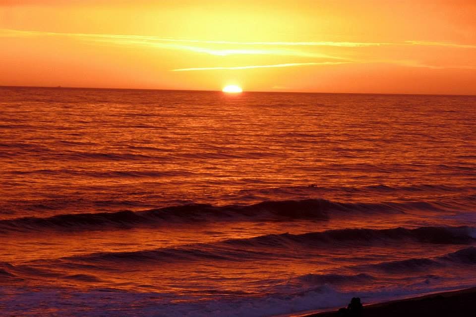 Sunset view from the driveway. The ADU has an ocean view from the gate when entering the unit.