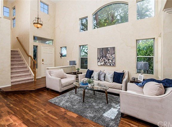 Formal Living room with high ceilings and lots of light
