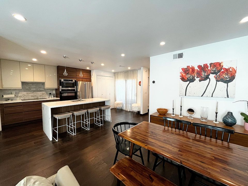 Great room concept with living, dining, and kitchen all open in one expansive space.