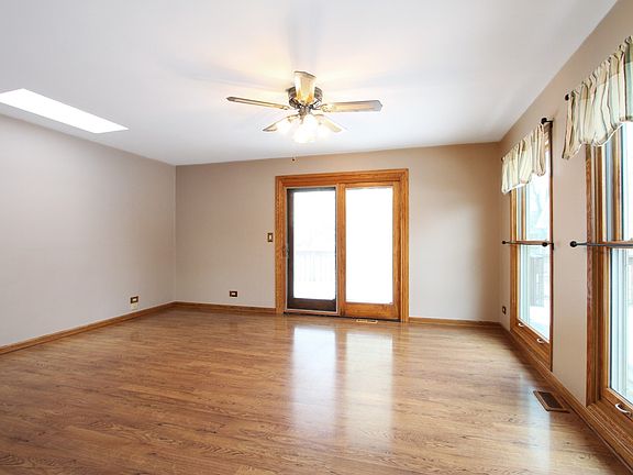 Large Dining Room great for entertaining and leads to the back deck through the Pella Patio Doors.