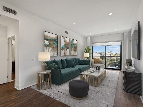 Living Room with Vinyl Flooring, Recessed Lighting, and Balcony