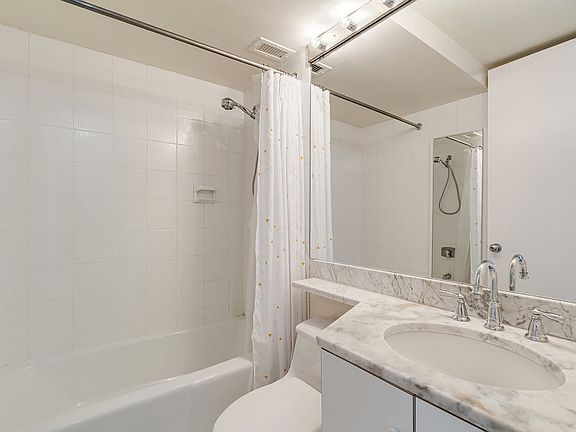 5th image of 30 W 61st St APT 15G
