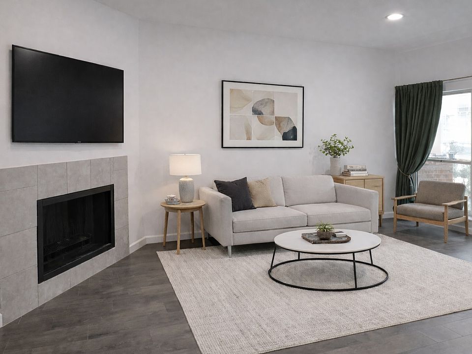 Living Room with Fireplace *Virtually Staged*