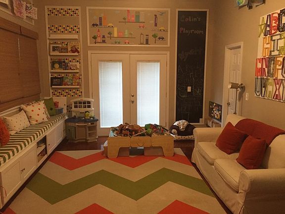 Downstairs bedroom w/ full closet that can also be used as a playroom, sunroom or music room.