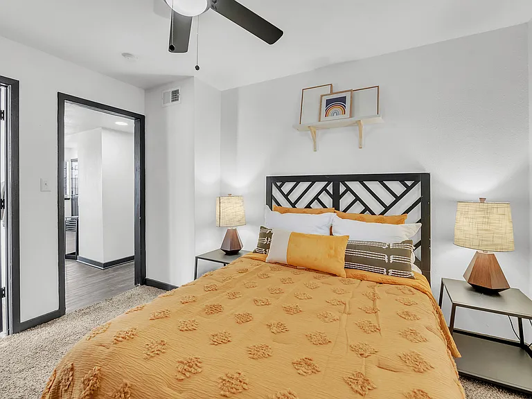 Immerse yourself in the comfort of this beautifully designed bedroom, where elegance meets coziness.