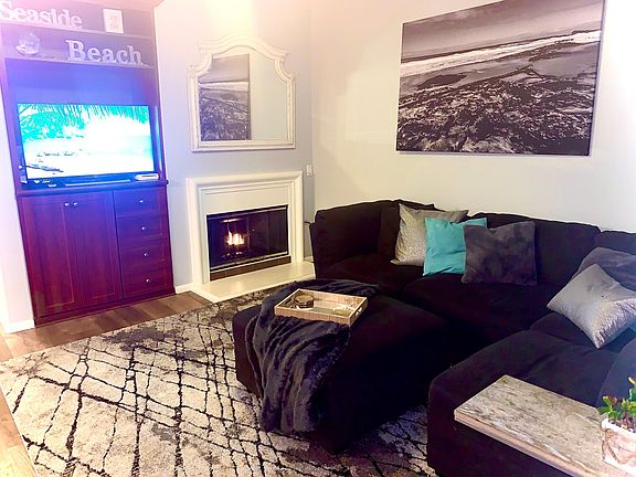 Family room with built in entertainment center and fireplace