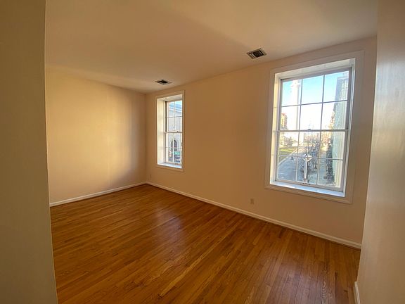 A warm and bright living room invites you in.