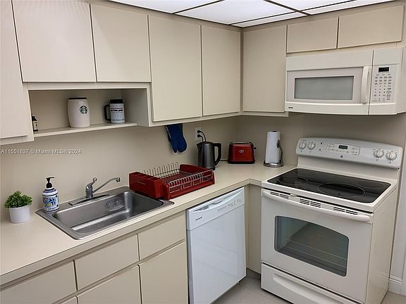 4th image of 9500 W Bay Harbor Dr APT 7E