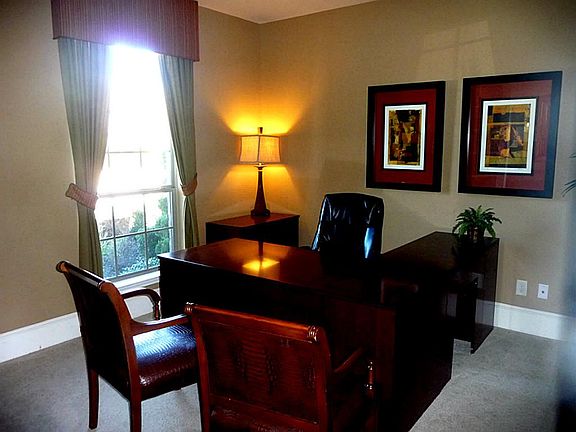 As you enter the home the Study is to the left featuring Double French Glass Doors!
