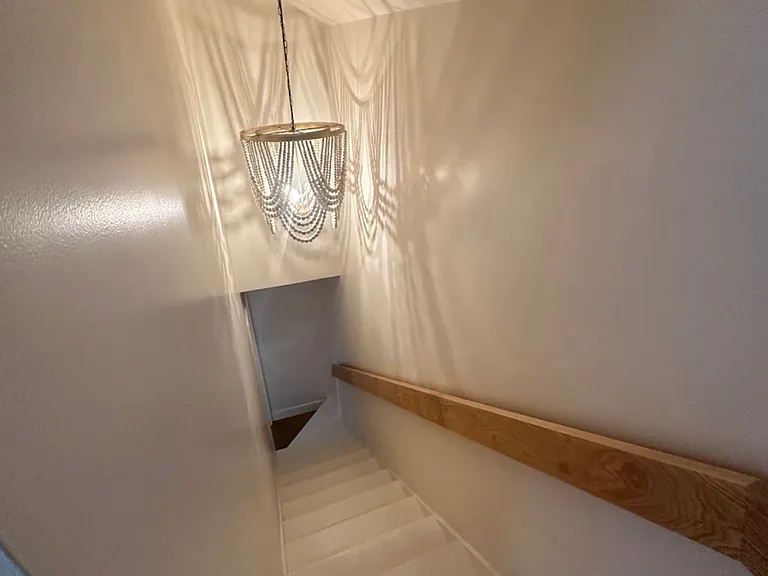 Hallway to the upstairs primary