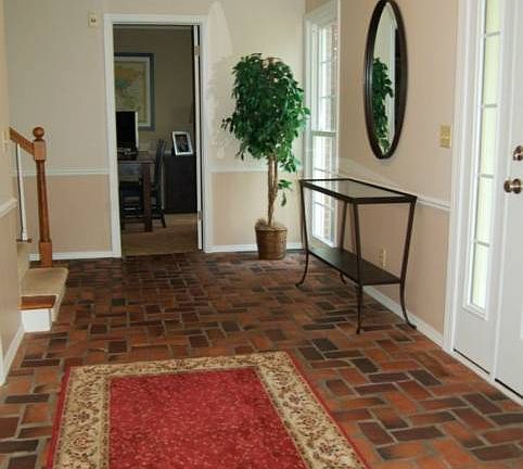 Original brick foyer.