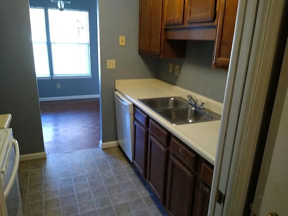 Kitchen with dishwasher. Dining room off kitchen.