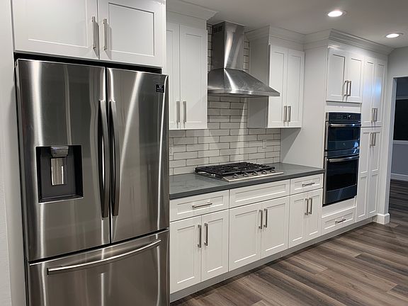 High end Samsung refrigerator, gas stove and built in microwave and oven