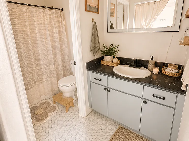 Virtually staged to showcase the home's layout with furnishings and highlight the potential look and feel of the furnished option.