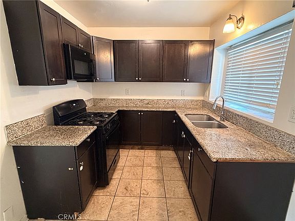3rd image of 8947 S Denker Ave