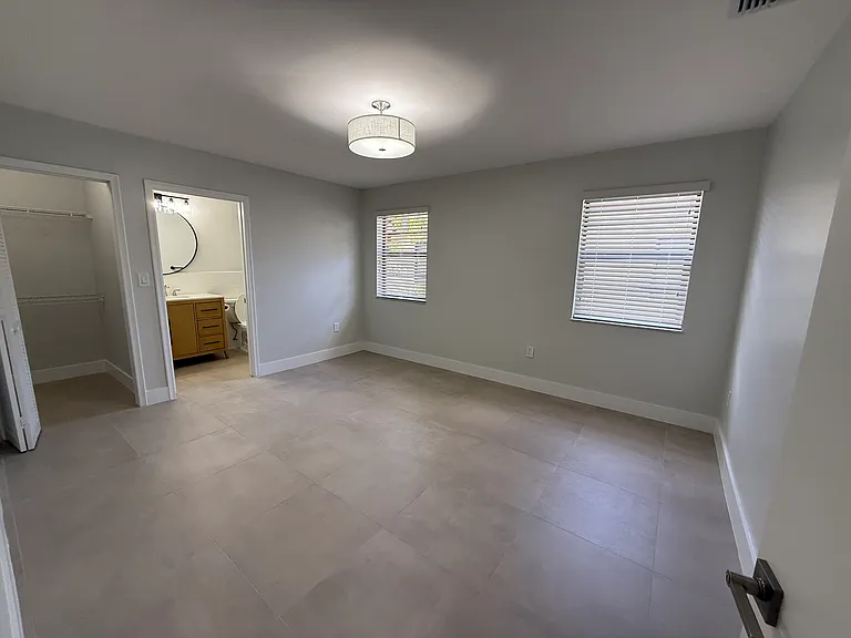 Master Bedroom with walk in closet and new bathroom