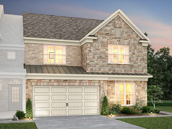 Montana Exterior 6 features stone and covered front door