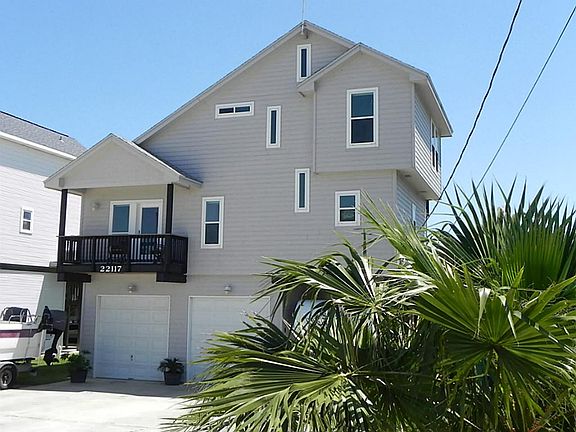 Street Elevation 22117 Guadalupe, Sea Isle. Oversized, double garage boasts raised storage with shel