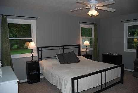 master bed with walk-in closet and full bath