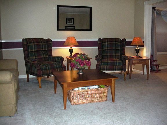 Utilitarian front room - great as a formal living room, music room or a den.