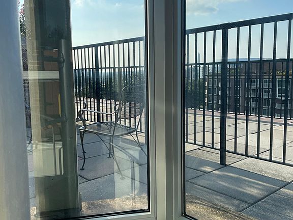 View from cupola entering private roof garden by spiral staircase from living room