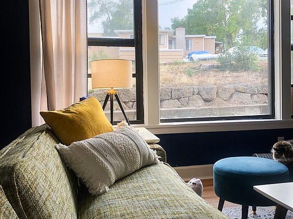 This window spans almost the entire wall in the living room providing ample natural light.