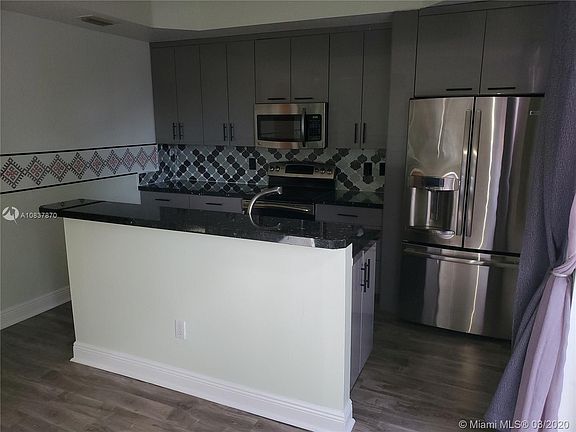 5th image of 4949 White Mangrove Way W #106-1